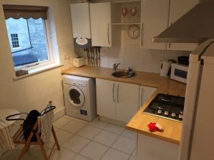 Central apartment with garage and parking