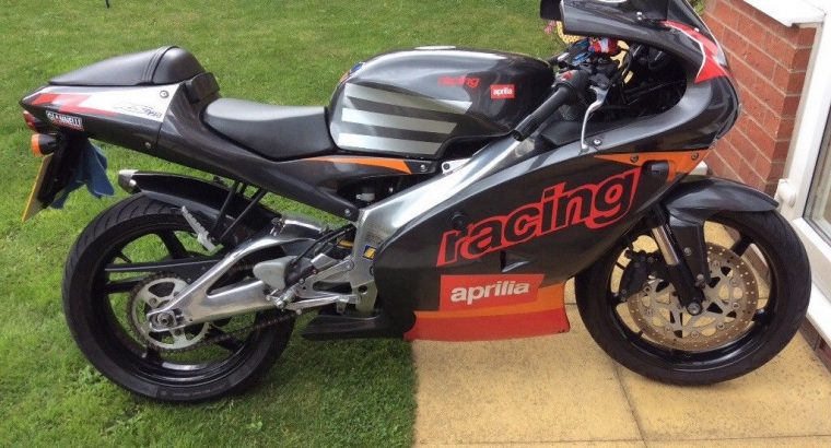 Motorbike with race exhaust Aprilia RS125