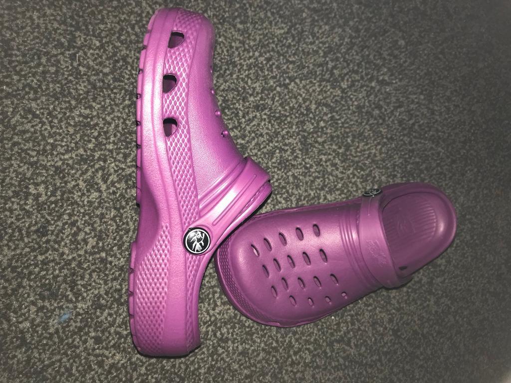 Size 13 Children’s purple and pink crocs