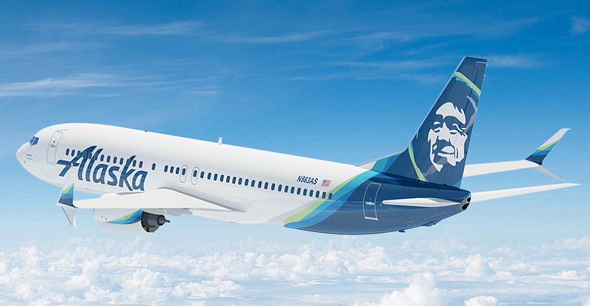 Can you upgrade to first class after purchase in Alaska?